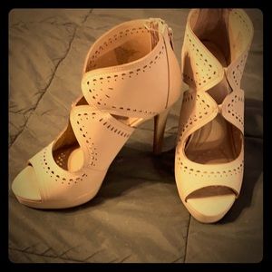 Nude peek a boo platform heels